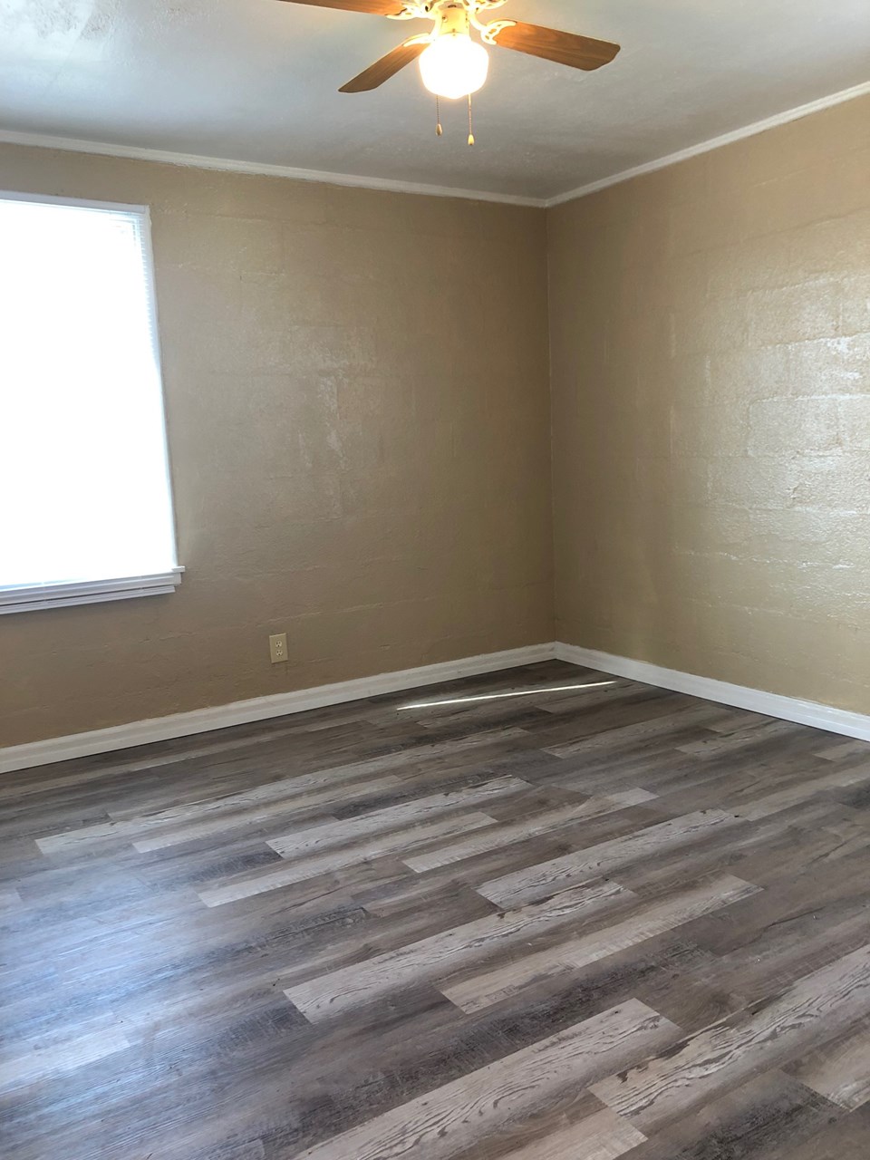 bedroom 2 with new vinyl plank flooring