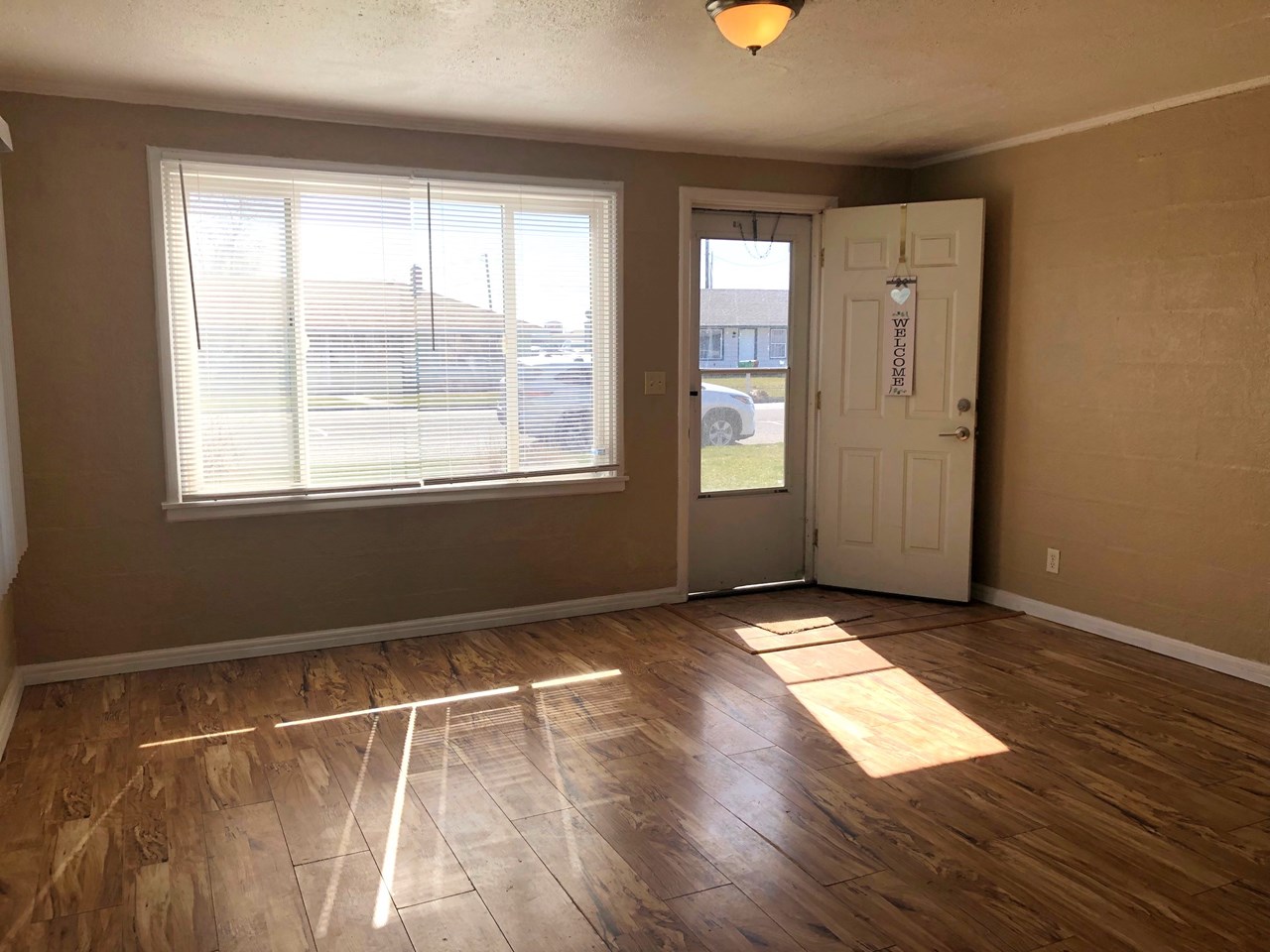 living room with laminate flooring